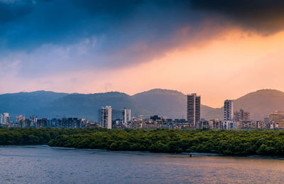 View of cityscape against sky during sunset
