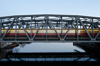 Low angle view of bridge against clear sky