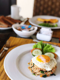 Close-up of breakfast served on table