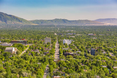 High angle view of trees and buildings against sky