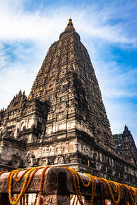 Mahabodhi temple buddhist stupas isolated with bright sky and unique prospective