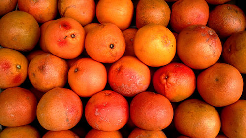 Full frame shot of oranges in market