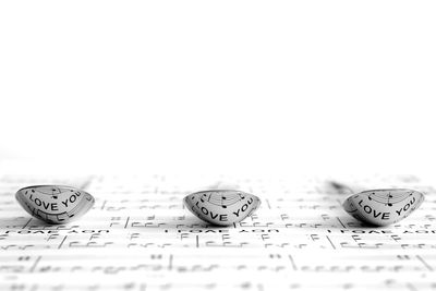 Close-up of text on paper over white background