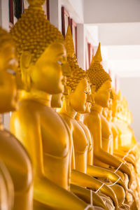 Buddha statues in row at temple