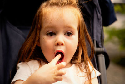 Close-up of boy eating food