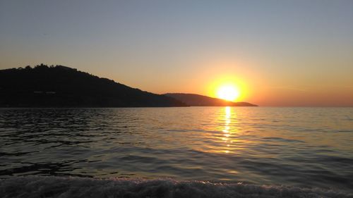 View of calm sea at sunset