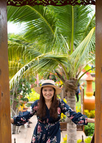 Portrait of smiling young woman outdoors