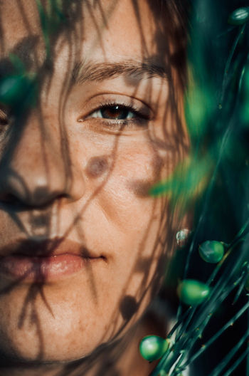 Close-up portrait of young woman