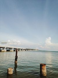 Pier over sea against sky
