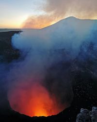 Scenic view of volcanic mountain against sky