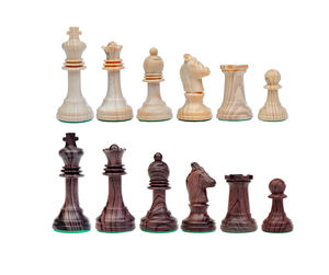 Low angle view of chess board against white background