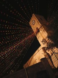 Low angle view of illuminated cathedral at night