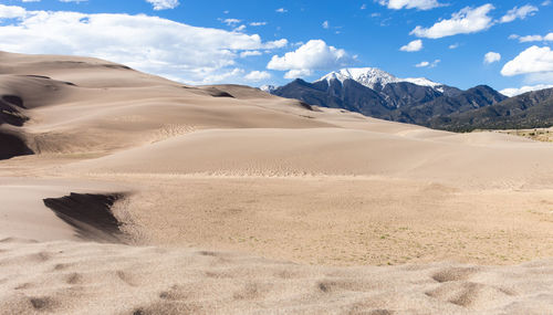 Scenic view of desert against sky