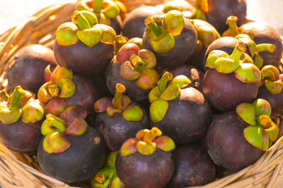 High angle view of grapes in basket