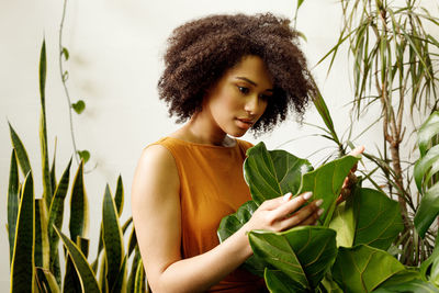 Young woman looking away outdoors