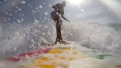 Close-up of man surfing