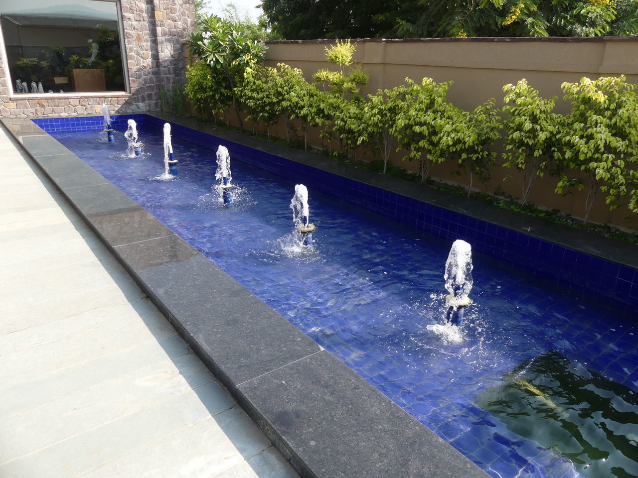 HIGH ANGLE VIEW OF SWIMMING POOL AT LAKE