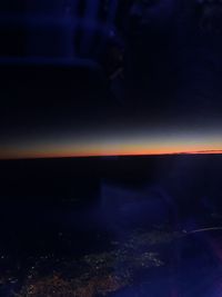 Scenic view of sea against sky at night