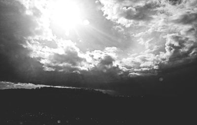 Scenic view of landscape against cloudy sky