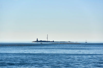 Scenic view of sea against clear sky