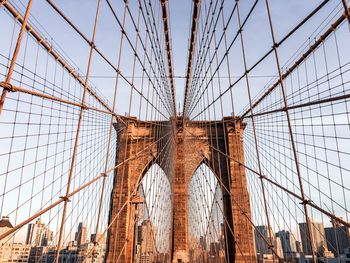 Low angle view of suspension brooklyn bridge