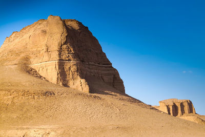 Idyllic shot of desert landscape against clear sky
