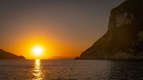 Sun path, sunrise over capri island