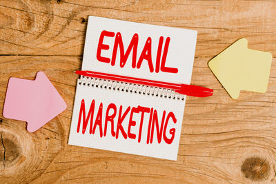 High angle view of information sign on table