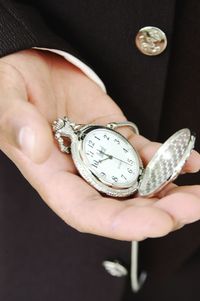 Close-up of human hand holding ring