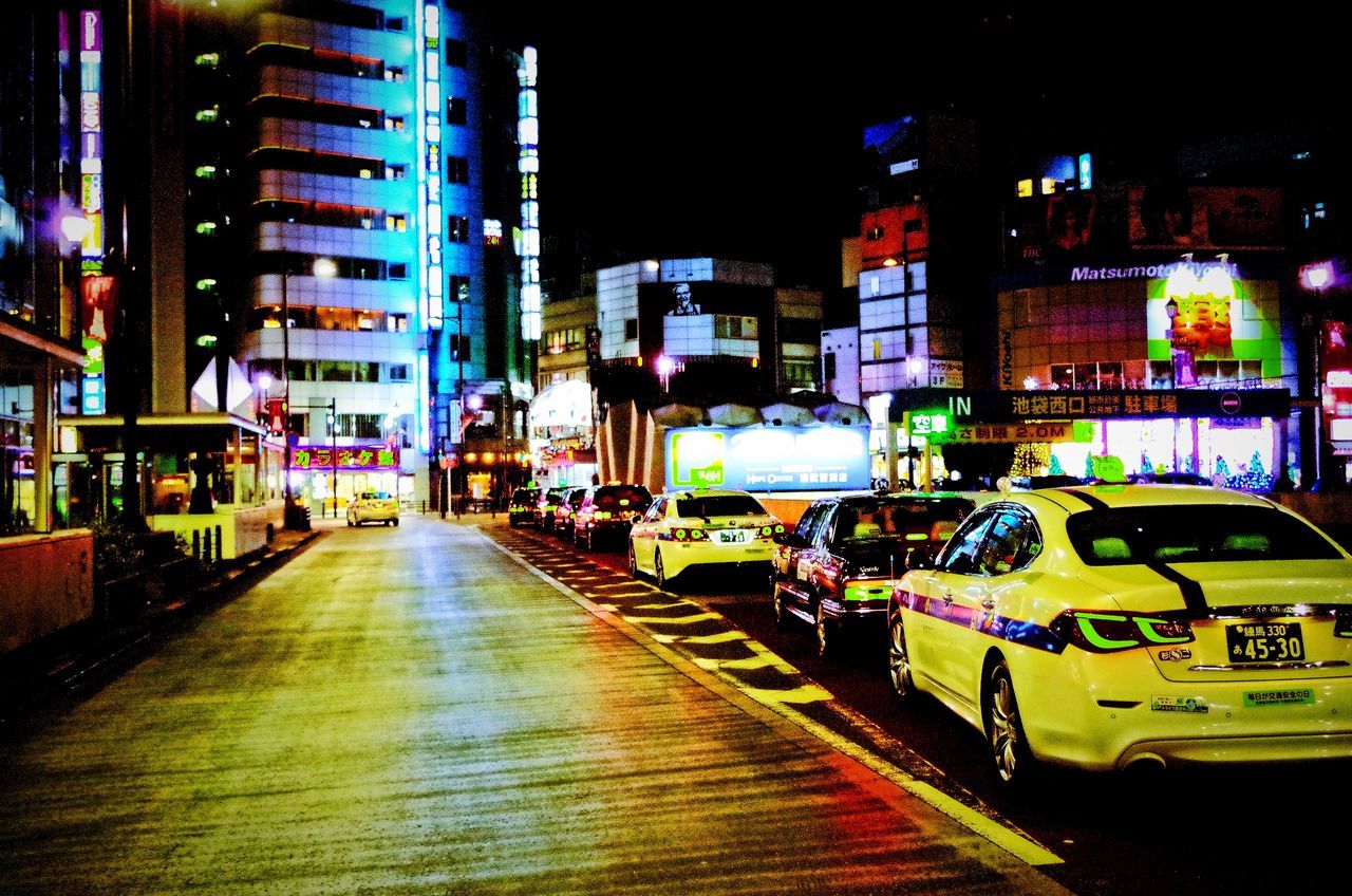 ILLUMINATED CITY AT NIGHT