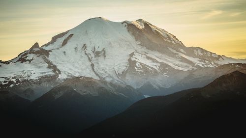 Scenic view of snow covered mountains