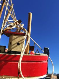 Low angle view of ship against clear sky