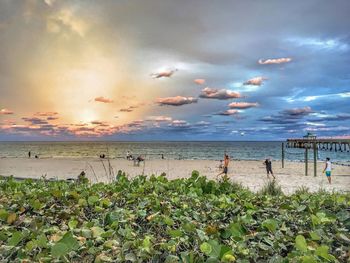 Scenic view of sea against cloudy sky