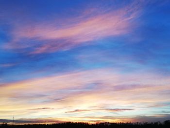 Low angle view of dramatic sky during sunset