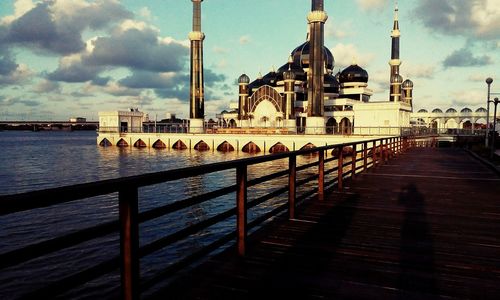 View of pier over river