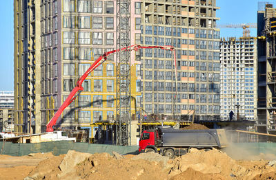 Builder workers during formworks and pouring concrete 