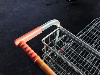 High angle view shopping cart on street