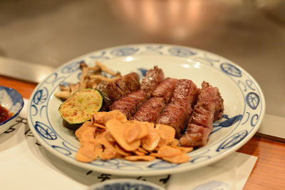 Close-up of food in plate on table