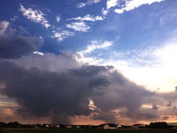 Scenic view of landscape against sky during sunset