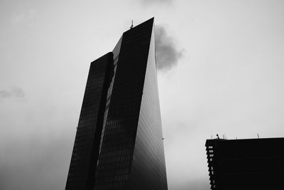 Low angle view of modern buildings against sky