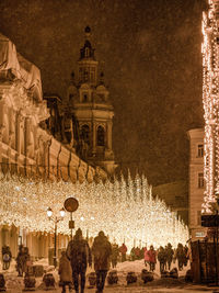 Illuminated christmas tree at night