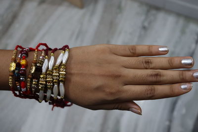 Close-up of hand tattoo against blurred background rakhi rakshabandhan festival celebration of india 