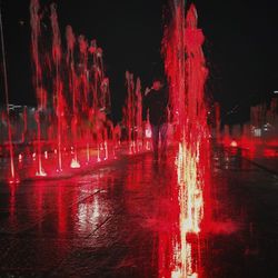 Illuminated light trails on street at night