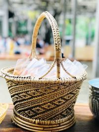 Close-up of wicker basket on table