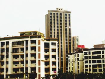 Low angle view of buildings against clear sky