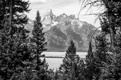 Scenic view of lake with mountains in background