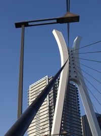 Low angle view of skyscraper against clear sky