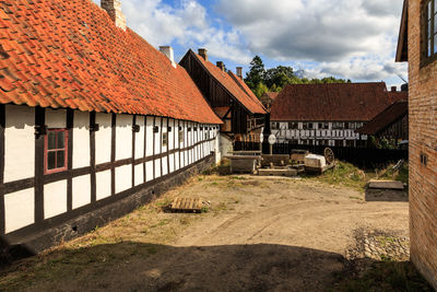 Houses and buildings against sky