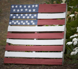 Close-up of flag on grass