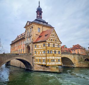 Bridge over river against sky